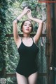 Beautiful Pichana Yoosuk shows off her figure in a black swimsuit (19 photos) P13 No.1d0c70