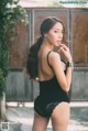 Beautiful Pichana Yoosuk shows off her figure in a black swimsuit (19 photos) P1 No.ae3d7f